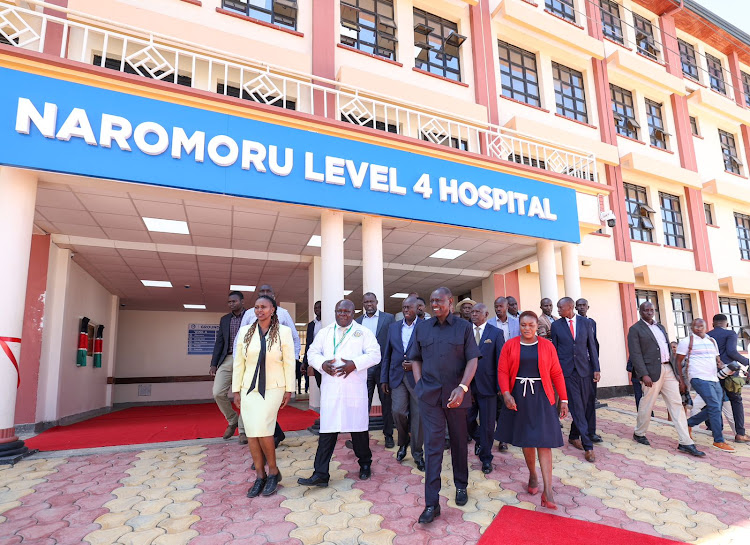 President William Ruto and Health Cabinet Secretary Susan Wafula in the company of doctors and other leaders during the commissioning of the Naromoru Level 4 Hospital in Kìeni Constituency, Nyeri county on August 9, 2023.