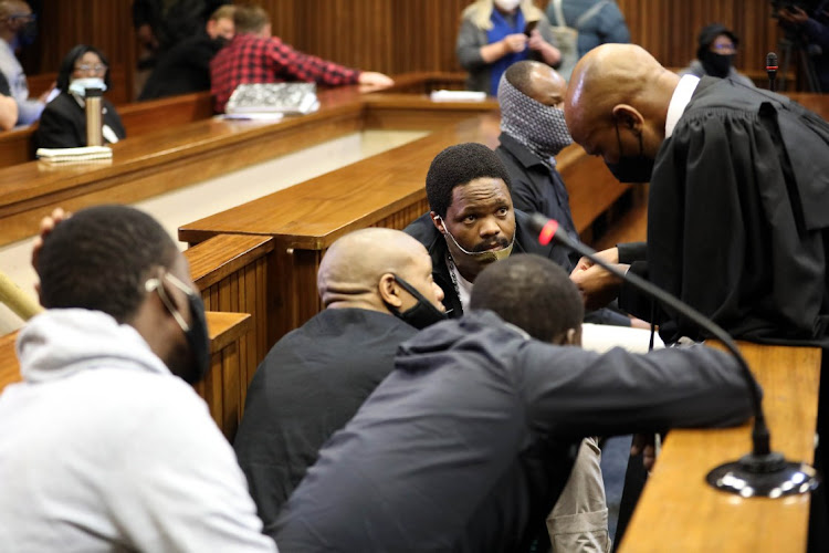 Advocate Malesela Teffo with some of five men accused of the 2014 murder of Bafana Bafana goalkeeper Senzo Meyiwa. File photo.