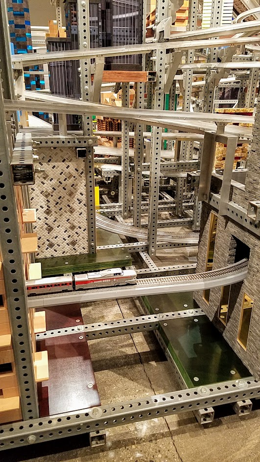 If you buy your LACMA museum admission, there is another Chris Burden exhibit you can view inside one of the building Broad Contemporary Art Museum. This is Metropolis II, also a sculpture but a kinetic one. Some of the times, it is a mini city, frozen in time with a lot of Hot Wheel Cars and Miniature trains on bridges and roads throughout the multiple levels.