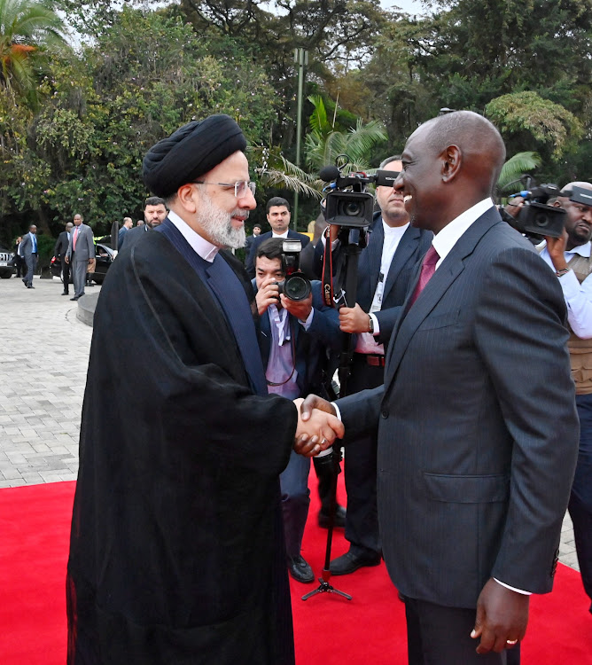Iran President Ebrahim Raisi being received by President William Ruto at State House, Nairobi, on July 12, 2023.
