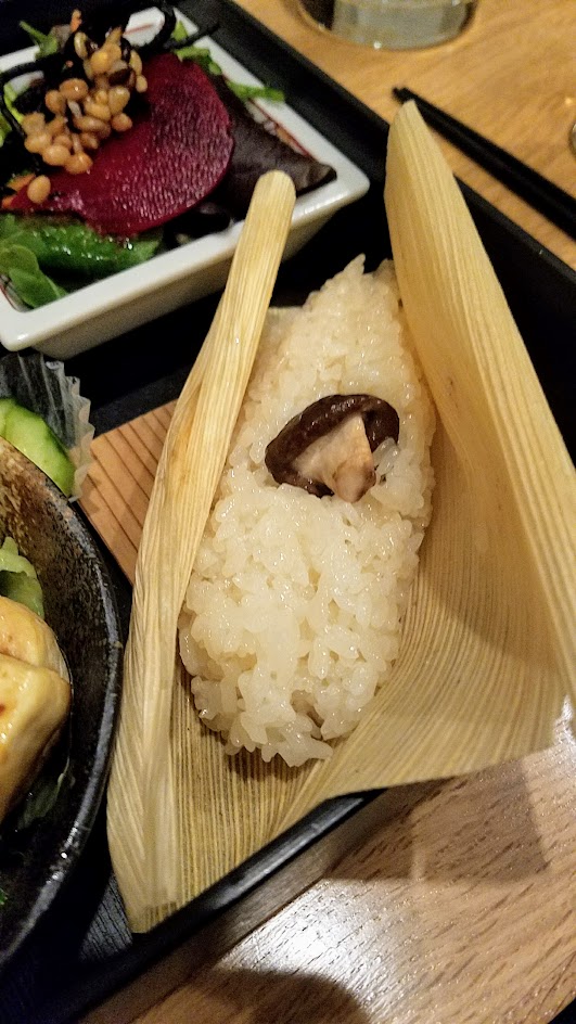 Chef Naoko's Shizuku - a restaurant with natural and organic Japanese cuisine, this is their vegan Shokado, an abbreviated kaiseki meal in a square lacquered box with Ota Tofu Steak and here special stickyish rice from Shizuoka Japan with chestnuts and mushrooms