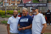 Proteas captain Temba Bavuma, Cheryl Hlabane, manager of the Frida Hartley Shelter, and Yusuf Dindar of Dreamz2Reality. 