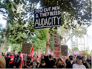 Protesters rally in response to the treatment of women in politics after several sexual assault allegations, as part of the Women's March 4 Justice rally in Melbourne, Australia, on March 15 2021. 
