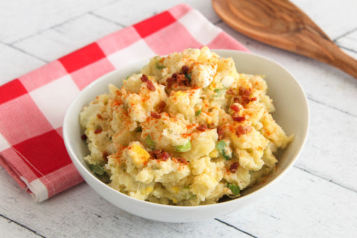 Bacon bits sprinkled on top of the Southern Potato Salad.