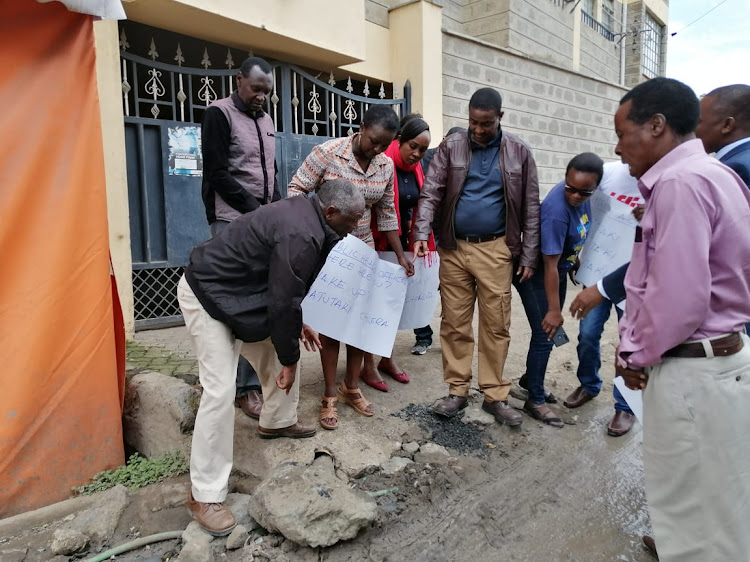 NEMA inspection officers at Balozi road in Kitengela