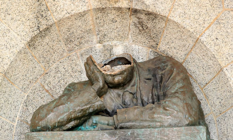 The damaged bust of colonialist Cecil John Rhodes after being vandalised in Cape Town on Tuesday.