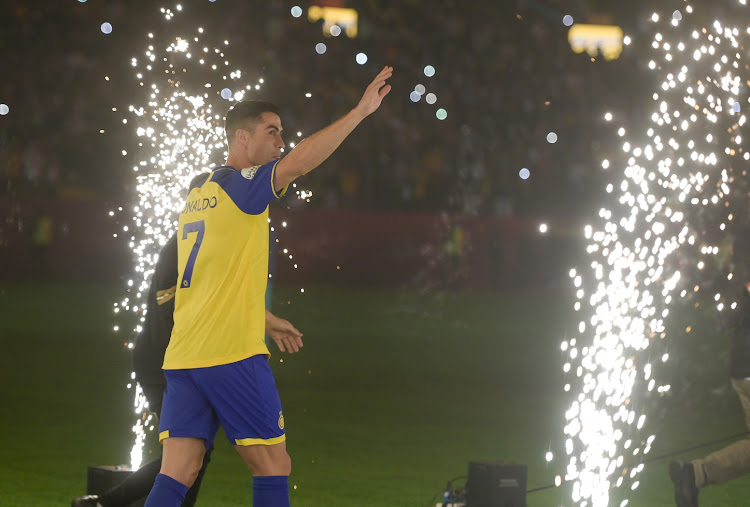 Cristiano Ronaldo waves to the fans as he is unveiled as an Al-Nassr player at Mrsool Park in Riyadh, Saudi Arabia on January 3 2023.