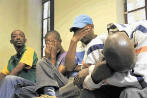 BUSTED: Three of seven suspected drug dealers that were arrested by the Hawks and the Tactical Response Team. The police netted seven of the targeted 12 men in one of the biggest arrests of drug dealers in Eldorado Park, Johannesburg. Photo: Katlego Moeng