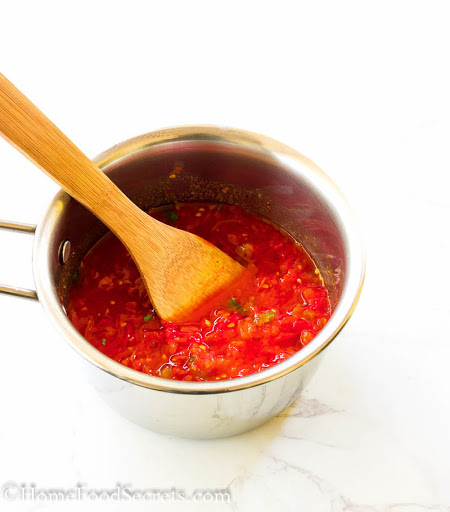 This easy Arrabbiata Sauce recipe is super easy to whip up and uses minimal ingredients, which make it the delicious pasta sauce EVER! This pasta sauce is thick, garlicky, and spicy with a rich flavor from fresh ripe tomatoes, olive oil, red bell pepper, 