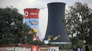 The western tower of the iconic Orlando twin towers is being adorned in the colours of Soweto Gold, a lager that is brewed in the historical settlement in Johannesburg. 