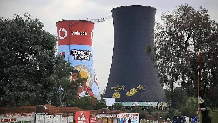 The western tower of the iconic Orlando twin towers is being adorned in the colours of Soweto Gold, a lager that is brewed in the historical settlement in Johannesburg.