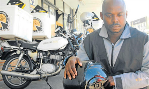 TRAUMATIC ORDEAL: Pizza delivery man Omoefe Acboriyede pictured outside the Cape Road franchise. Picture: FREDLIN ADRIAAN / HERALD