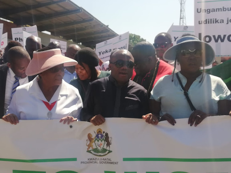 KZN premier Sihle Zikalala with MEC for social development Nonhlanhla Khoza, left, and health MEC Nomagugu Simelane-Zulu during a march against violence against women, children and foreign nationals.