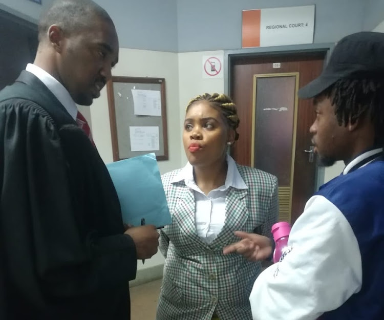 Sibongile Mani with her lawyer Asanda Pakade. University student Mani allegedly spent R810,000 in 73 days. File photo.