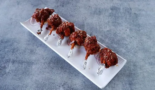 Chicken Lollipop In Schezwan Sauce