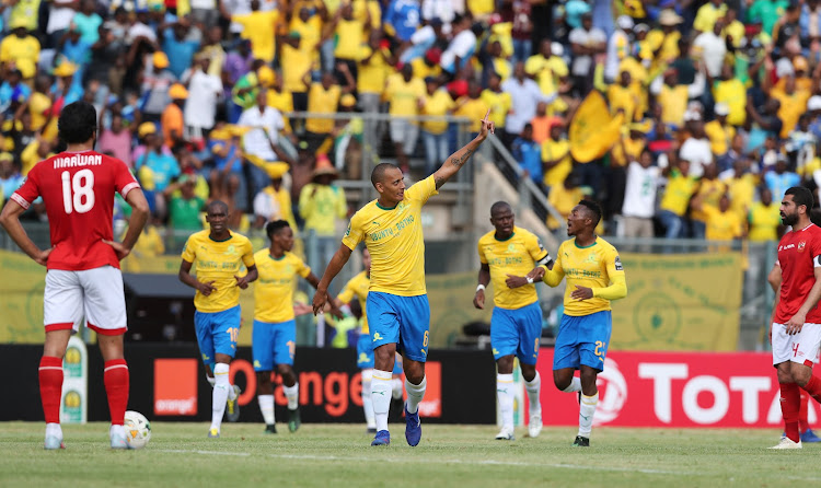 Mamelodi Sundowns defender Wayne Arendse celebrate a goal with his teammates during a thumping 5-0 Caf Champions League first leg quarterfinal win over Al Ahly at Lucas Moripe Stadium on April 6 2019.