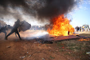 Residents in Mohlakeng, Randfontein, burned shacks in Extension 11 and ransacked two homes close to mine shafts.