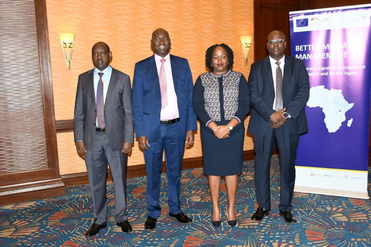 Tourism PS John Ololtuaa, Julis Bitok (Immigration), Veronica Nduva (Gender) and Idris Dakota (ASAL) during the breakfast meeting on management of migrants in Kenya