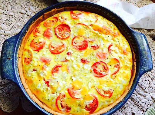 Tomato and buttery cheese make this quiche a winner!