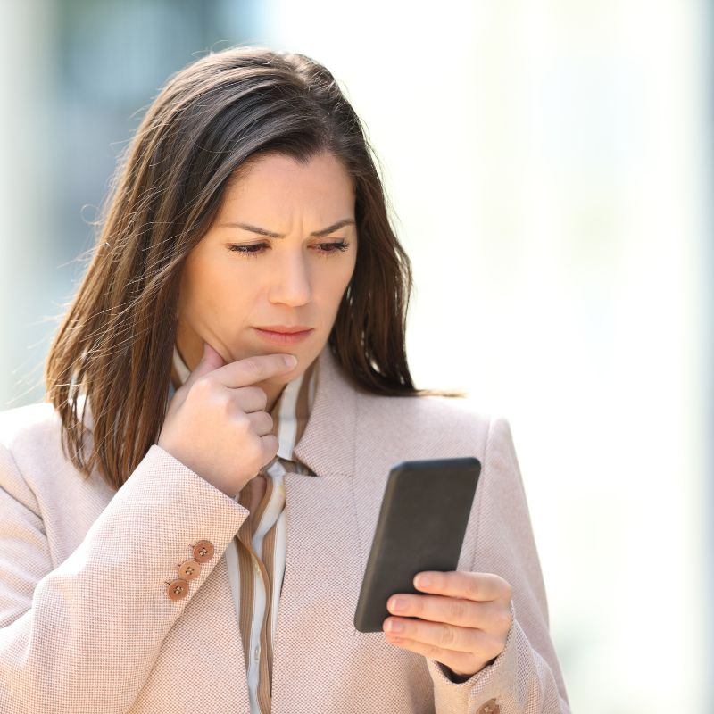 a woman thinking about how to write compelling messages