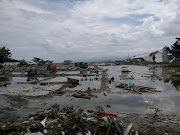 The ruins of cars as seen after tsunami hit in Palu, Indonesia September 29, 2018. 