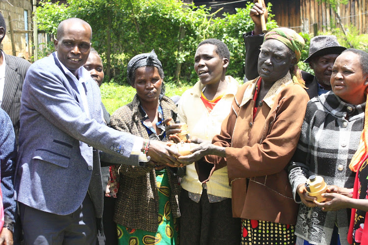 Baringo Central MP Joshua Kandie hands over water meters to Kapkong borehole beneficiaries in Kituro on Monday