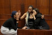 Sandiswa, Nozipho and Philasande Khuzwayo, family of Yolanda Khuzwayo, who was allegedly stabbed by Durban metro police constable Sizwe Ngema, were overcome with emotion when they saw him in the Durban magistrate’s court. 