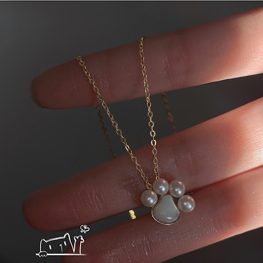 Title 3, Womens necklace featuring pearl shell and cat...