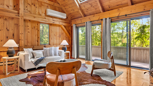 Wooded living room with garden view in this luxury house for sale in Monterey ($725,000)