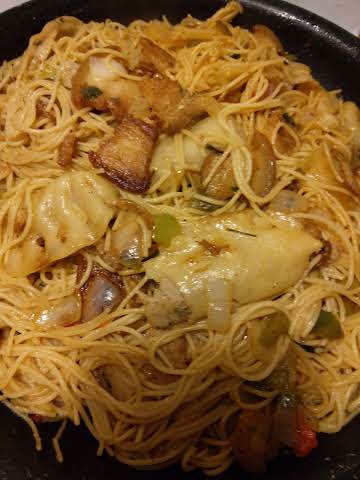 Angel hair pasta with pork belly and dumplings