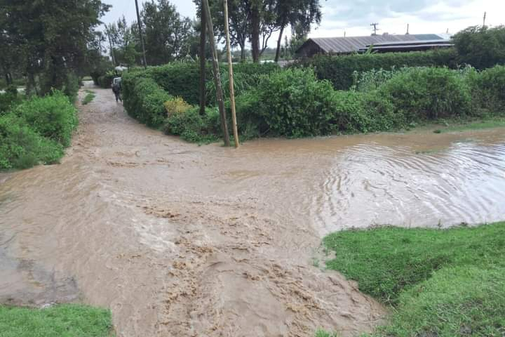 Flood waters fill footpaths at a village in Nyeri County, April 30, 2024.