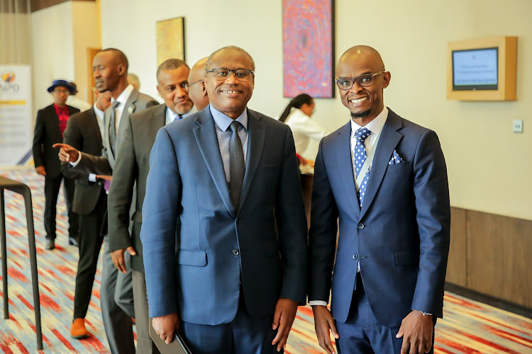 Rwanda’s Minister of Finance and Economic Planning Dr. Uzziel Ndagijimana and Francis Nasyomba, CFA Principal Raisin Capital and President, CFA Society East Africa pose for a photo in Kigali, Rwanda.