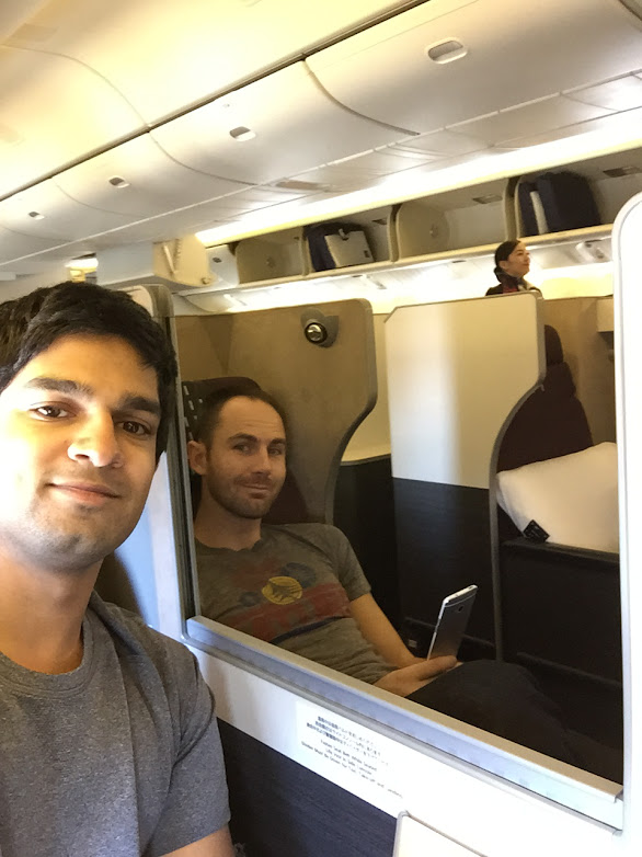 a man taking a selfie in an airplane