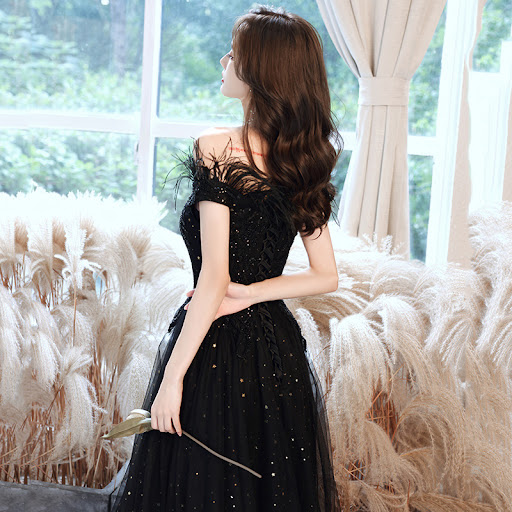 Title 6, Black evening dress for women, offering eleganc...
