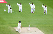 England batsman Rory Burns and members of the West Indies team take a knee in support of the Black Lives Matter movement during the second Test at Old Trafford in July. England stopped making the gesture in the following home series against Pakistan and Australia. 