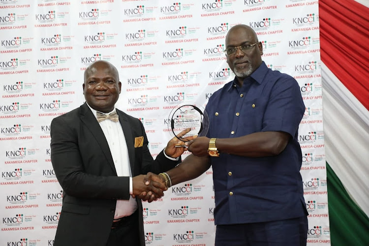 Governor Fernandes Barasa with Ken Onditi, KNCCI Nyanza regional director during the Kakamega Gala Business Awards /IMAGE/HILTON OTENYO