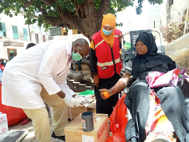 Hafswa Aboud donates blood in Lamu island.