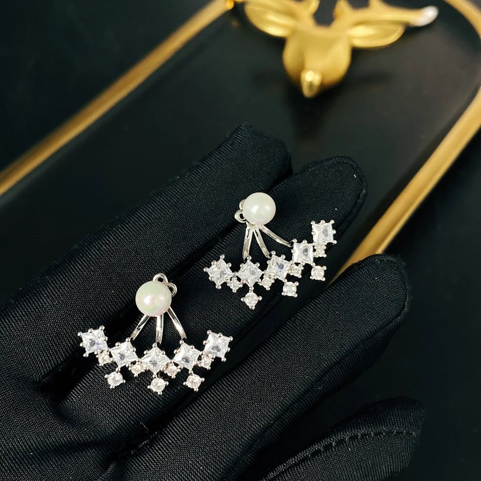 Boucles d'oreilles à clous en perles S925 minimalistes et créatives, élégantes et discrètes, parfaites pour un usage quotidien.