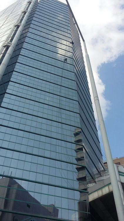 Three high-rise window washers had to be rescued after being battered about by gusting winds in the Durban central business district.