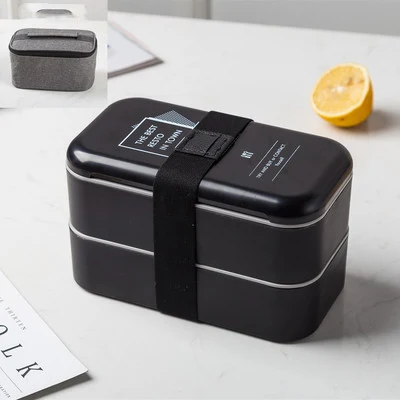 Dubbellaagse lunchbox van plastic, grote capaciteit, magnetronbestendig. Ideaal voor ruime lunches en maaltijden onderweg.