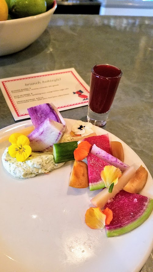 Guests were welcomed to the Kachka brunch celebrating Maslenitsa with a vitamin shot called Triple Sunrise with horseradish vodka, apple juice, beet juice, and celery bitters, and then given a crudite plate with dill butter