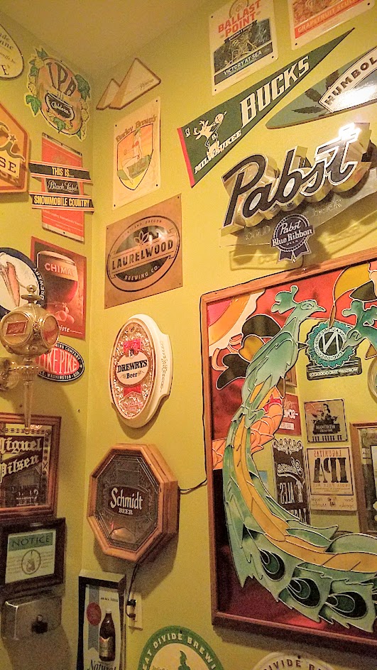 When you walk through that door of Saraveza, you immediately feel a bit like you're in a beer museum with all the retro beer paraphernalia all along the walls, including even in the bathroom