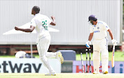 Rohit Sharma examines the damage after being bowled by a peach of a ball from Kagiso Rabada on day three of the first Test between India and SA in Centurion. 