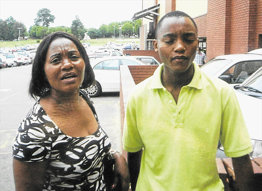Gloria Sekwena with her son, Kgositsile, 18, who found her dead after a stampede at the University of Johannesburg
