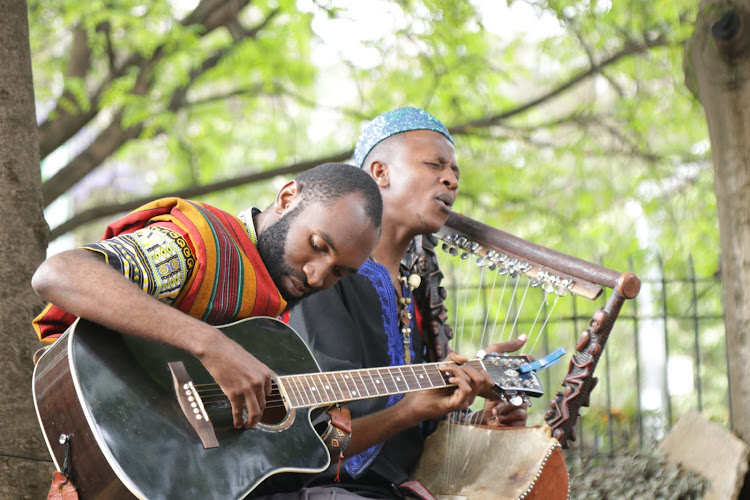 Papillon, who makes all his own instruments and writes all his own songs, holds forth at Nairobi Gallery with guitarist Paul