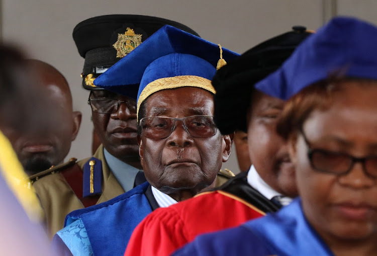 Zimbabwe President Robert Mugabe attends a university graduation ceremony in Harare, Zimbabwe, November 17, 2017.