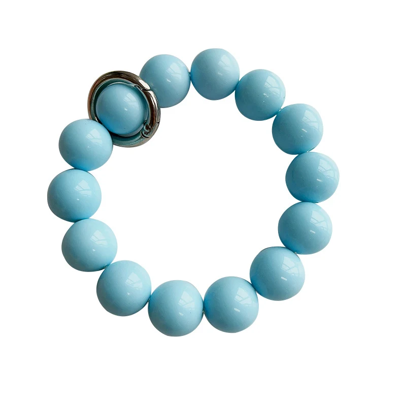 Chaîne de téléphone pour fille, style simple, couleur unie et grosses perles. Transportez votre portable avec style et sécurité.