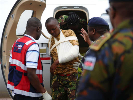 INJURED: KDF soldier Eric Wambugu arrives at the Wilson Airport, Nairobi, on Saturday. He survived the Shabaab attack on the KDF camp in El Adde, Somalia. The terror group attacked the camp in Gedo region at dawn last Friday.