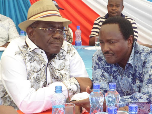 Wiper chair David Musila consults with the party leader Kalonzo Musyoka during an earlier party meeting inYatta. Photo/FILE