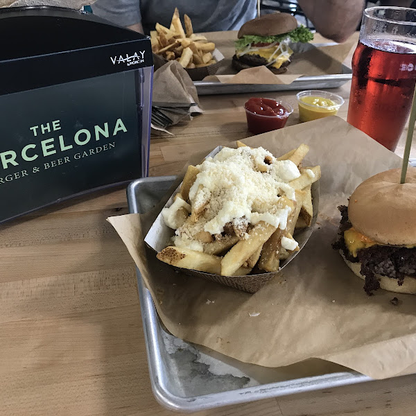 This is the Madrid burger on GF bun with truffle fries. Please note, there is cross contamination for the fries.